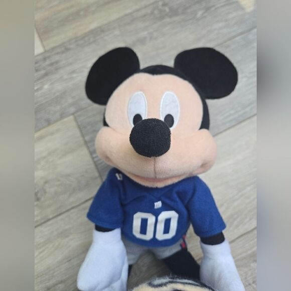 Giants blanket with Disney's Mickey plush hugging it - Picture 10 of 12